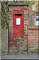 Benchmarked pillar box outside #55 Albert Road