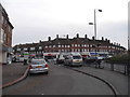 TQ2766 : Shops on the Middleton Road roundabout by David Howard