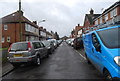 Narrow gap between parked cars