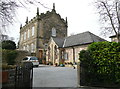 The Old Grammar School and a modern bungalow