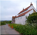 Ingst Road passes Walnut Tree Cottage near Elberton