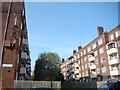 Looking through the gap between two blocks to Seven Sisters Road #3