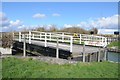 Opening swing bridge