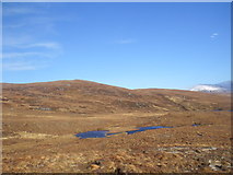 NH1986 : Feur Loch in Inverlael Forest by Ullapool by ian shiell