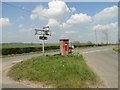 Postbox and finger post