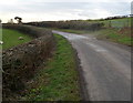 Field gate at a bend in the road, Clawdd y Parc Farm near Llangybi