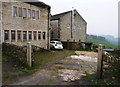 Ripponden FP63 passing modernised cottages at Bank Hall 