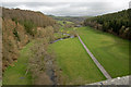 Looking up the river Bray in Castle Hill Park from the A361