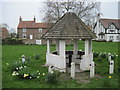 Village  Water  Pump  and  covered  seating