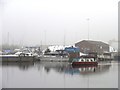 SE7322 : Narrowboat passing Viking Marina on a misty morning by Christine Johnstone