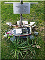 HU6871 : Grave in the Housay cemetery by Julian Paren