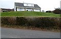 House on a small ridge above Usk Road near Llanvair Discoed