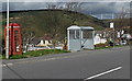 SS9788 : Phonebox, bus shelter and distant wind turbines, Gilfach Goch by Jaggery