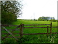 SU6947 : Pylon line across fields at Upton Grey by Shazz
