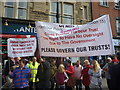 NT6779 : John Muir Festival Dunbar 2014 : Protest Banner In The High Street by Richard West