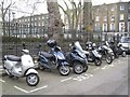 TQ3082 : Motor scooters parked, Argyle Square by Robin Stott