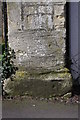 Benchmark on gatepost at Marston Road church entrance