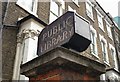 TQ3086 : Public library sign, Manor Gardens by Jim Osley