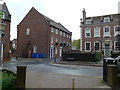 Looking from the churchyard into St James Close