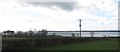 J2115 : Power lines between the Killowen Road (A2) and the sea by Eric Jones