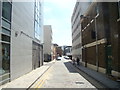 TQ3481 : View down Gowers Walk from Commercial Road by Robert Lamb