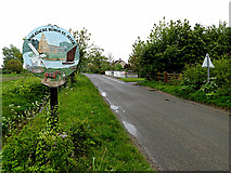 TM4693 : Wheatacre Village sign & Beccles Road by Geographer
