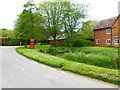 Village pond and telephone box in Bradley