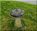 Sundial by village pond