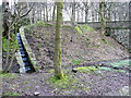 Water chute in railway embankment