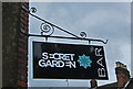 The Secret Garden (3) - sign, 17-20 New Road,  Kidderminster