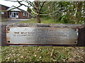 TM0321 : Plaque  on bench on High Street (B1028) by Hamish Griffin