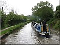 Working narrowboat heading to Whaley Bridge