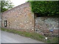 Large wall with four interesting things, Charlton St Peter