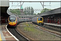 SJ8989 : Trains, 390126 and 323235, Stockport railway station by El Pollock