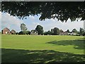 TL4832 : Clavering: cricket on the green by John Sutton