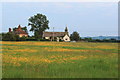 All Saints church in Goosey at sunset