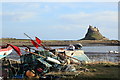 NU1241 : Fishing gear and boats, The Ouse, Holy Island by Rob Noble