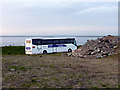HY4312 : A 'J & V' Coach parked near the ferry terminal at Hatston by John Lucas