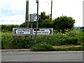 TL8546 : Roadsigns on the A1092 Windmill Hill by Geographer