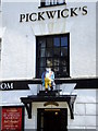 Mr Pickwick leaves the tea room of his name