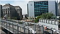 TQ3880 : View over roads and bridges from East India DLR station platform by David Martin