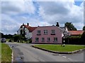 Houses and signpost, Matching Green