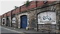 NZ2463 : Lock-up gargages under Railway arches, Pottery Lane, Newcastle upon Tyne by Graham Robson