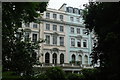 View of pastel-coloured houses on Cornwall Gardens from Cornwall Gardens