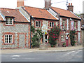 Brick and flint pub and cottages