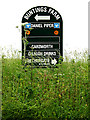 TL8245 : Buntings Farm Business Centre sign by Geographer