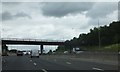 TQ5296 : Murthering Lane bridge over M25 by David Smith