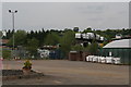 Stacked scrap cars on the way into Daventry