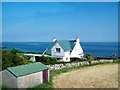 House above the sea at Danes