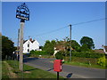 The setting of the village sign for Ruckinge